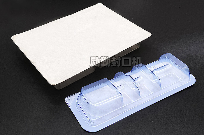 广州励勤特卫强吸塑封口机案例 广州励勤特卫强吸塑封口机案例